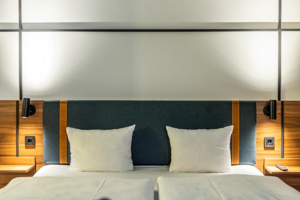 Postel nebo postele na pokoji v ubytování Comfort Hotel Vesterbro