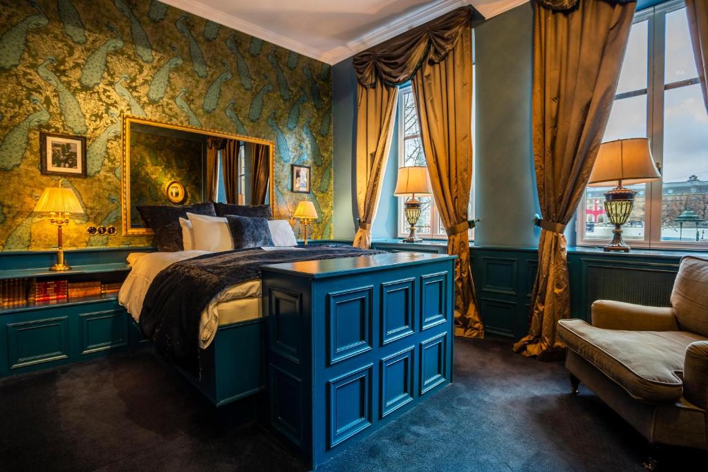 Postel nebo postele na pokoji v ubytování Hotel Pigalle