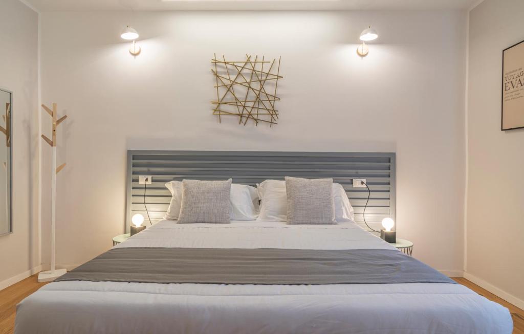 Postel nebo postele na pokoji v ubytování SoClà Boutique Hotel RTA