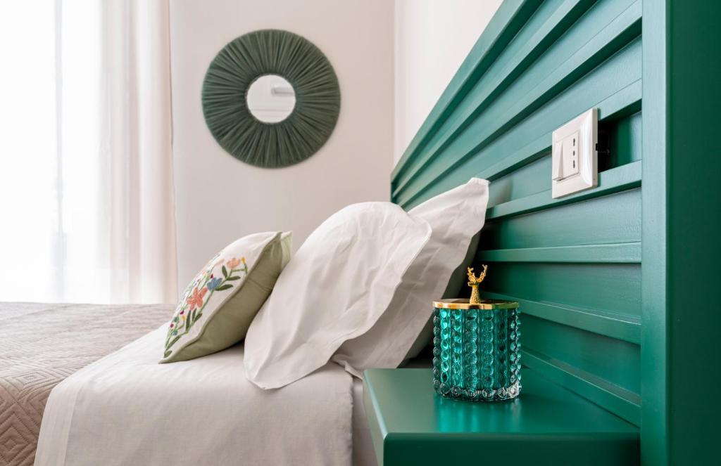 Postel nebo postele na pokoji v ubytování SoClà Boutique Hotel RTA