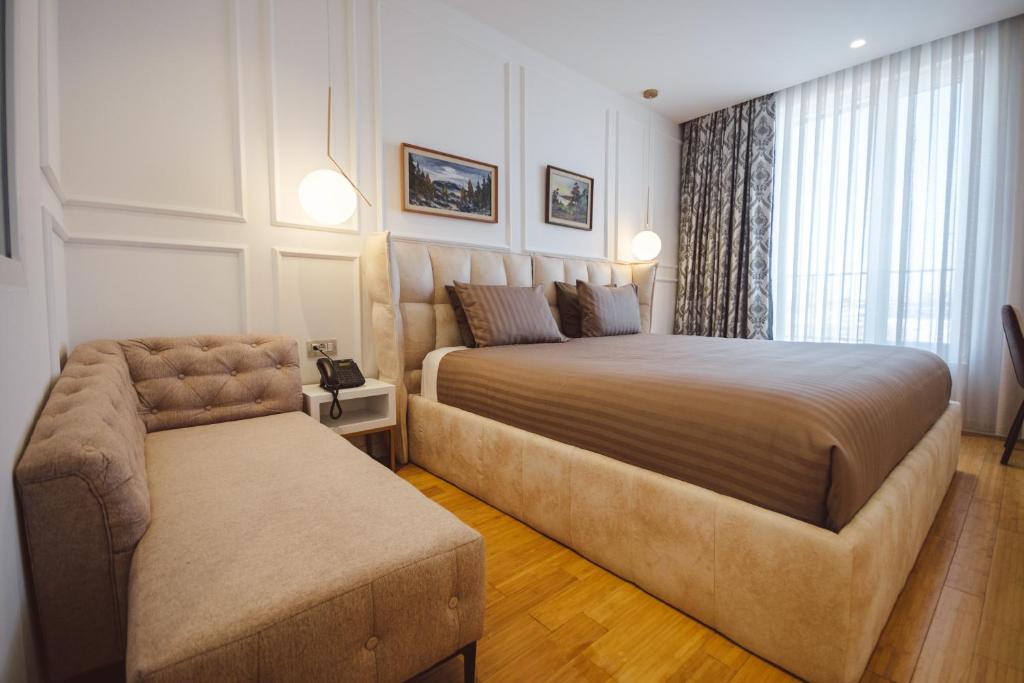 Postel nebo postele na pokoji v ubytování Star Hill Hotel & Spa