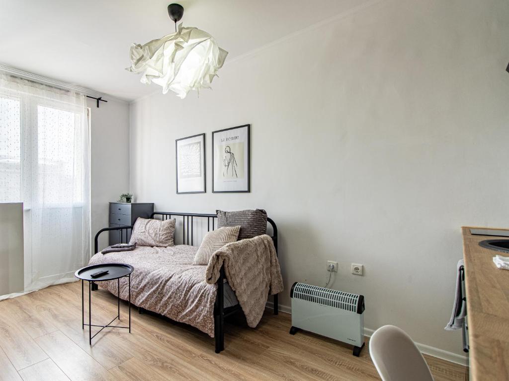 Postel nebo postele na pokoji v ubytování Largo Loft - Central Sofia Studio