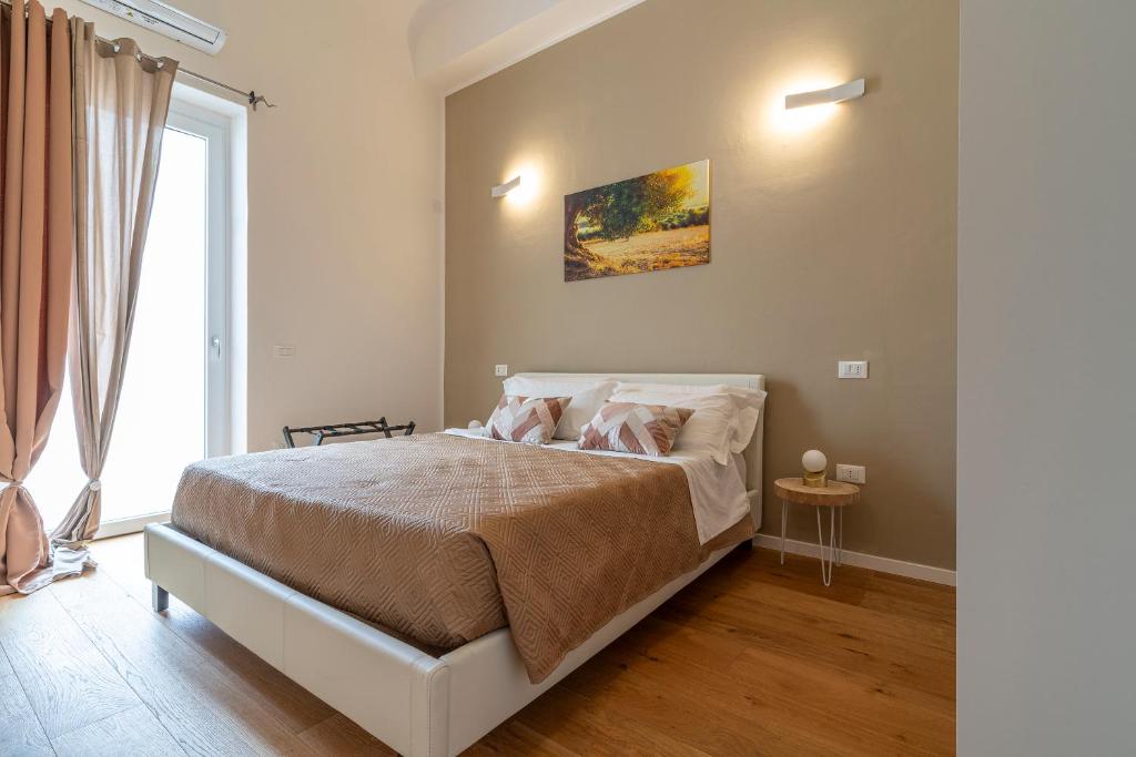 Postel nebo postele na pokoji v ubytování SoClà Boutique Hotel RTA