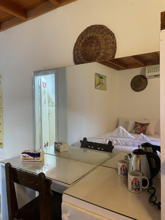 Postel nebo postele na pokoji v ubytování Nubian palace - by kerma hospitality