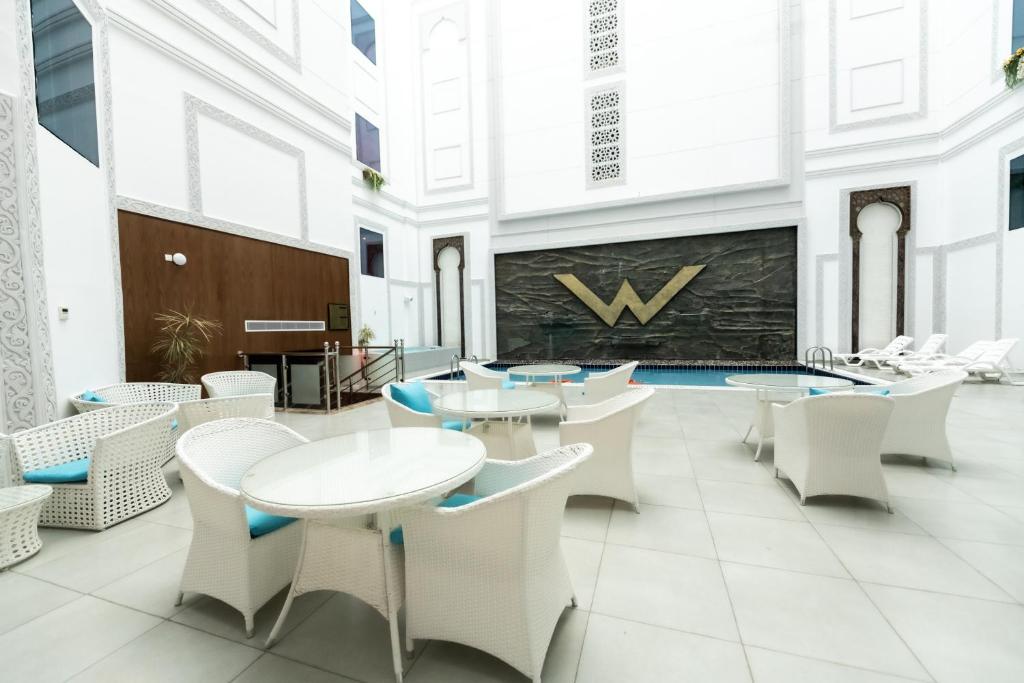 TV a/nebo společenská místnost v ubytování WA Hotel