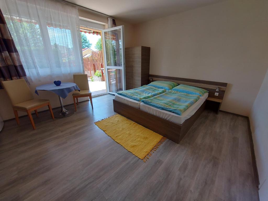 Ένα ή περισσότερα κρεβάτια σε δωμάτιο στο Pauzo Bagyarik