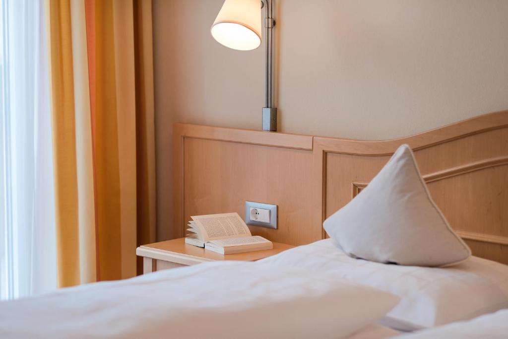 Postel nebo postele na pokoji v ubytování Pension Höfler - Fernblick
