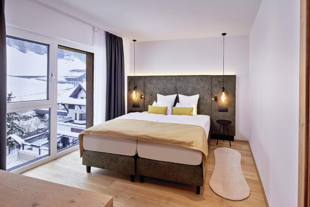 Posteľ alebo postele v izbe v ubytovaní Active Nature Resort DAS SeeMOUNT