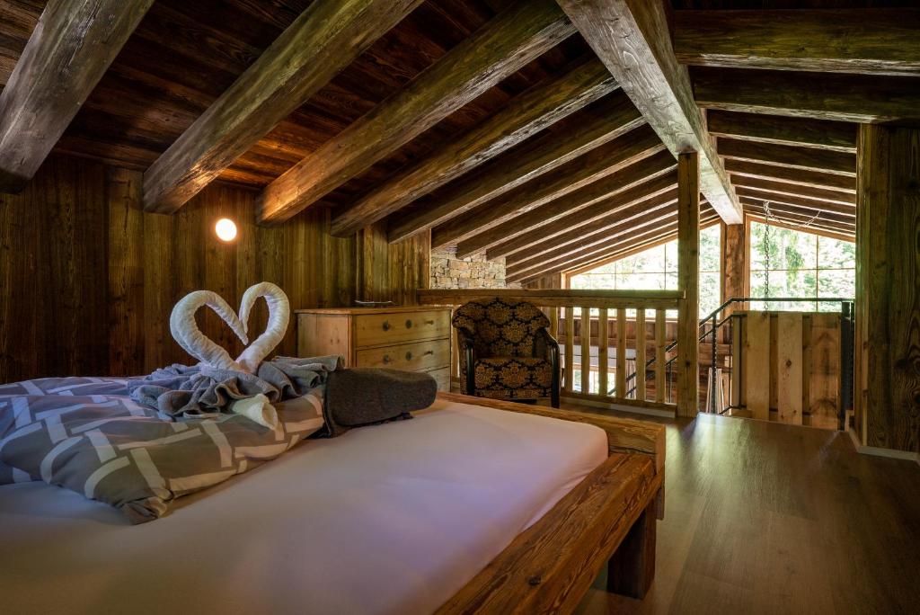 Postel nebo postele na pokoji v ubytování Wochenbrunner Chalets