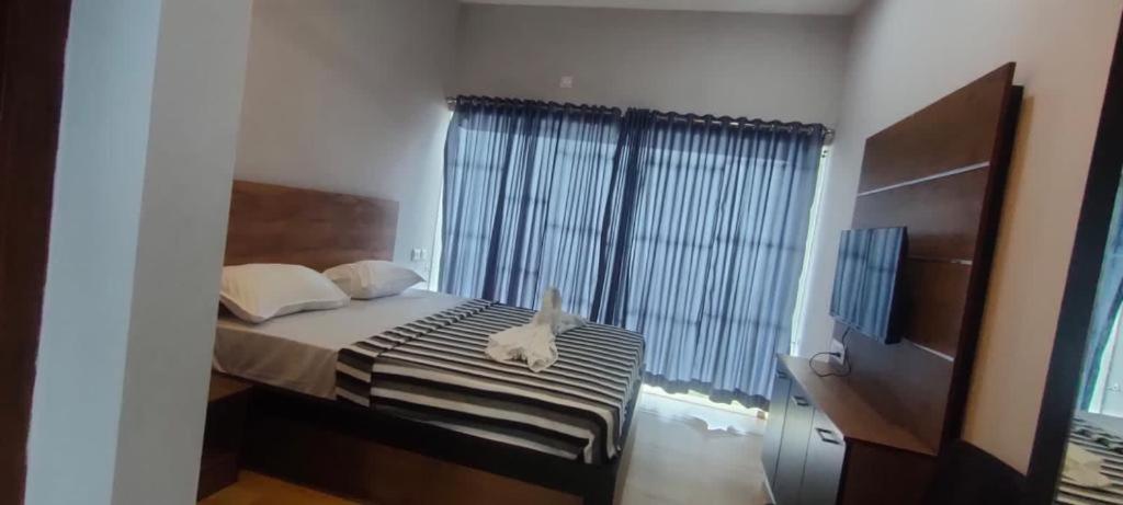 Postel nebo postele na pokoji v ubytování Rock View Resort