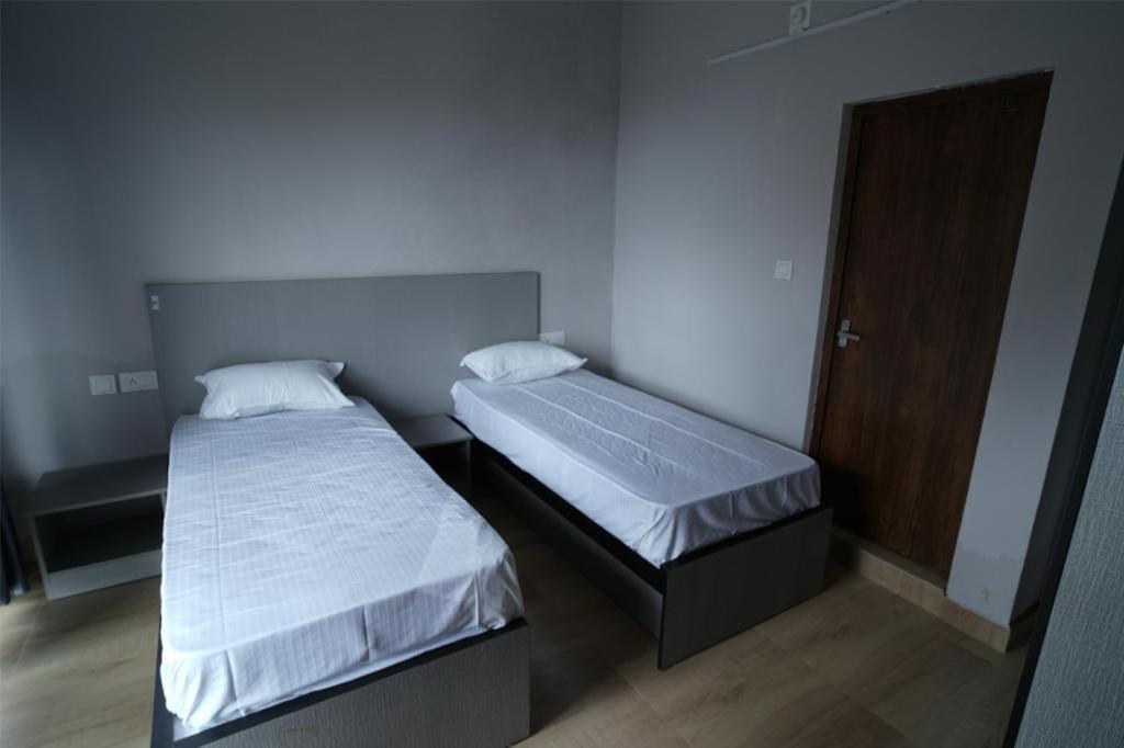 Postel nebo postele na pokoji v ubytování Rock View Resort