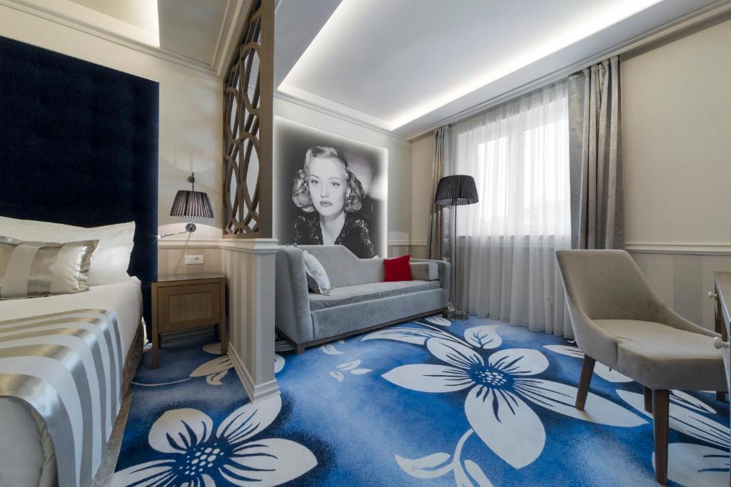 Posteľ alebo postele v izbe v ubytovaní Grand Hotel Slavia - Adults only