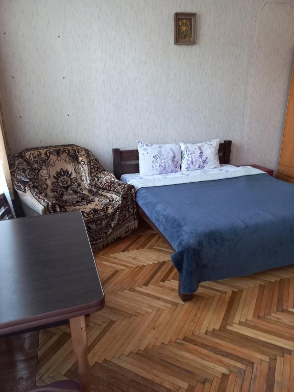 Postel nebo postele na pokoji v ubytování ВВ-ХОСТЕЛ