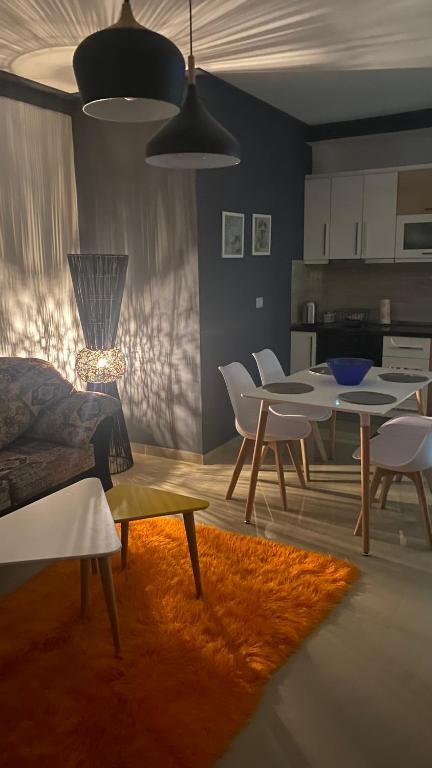 Posezení v ubytování Guest's Apartament