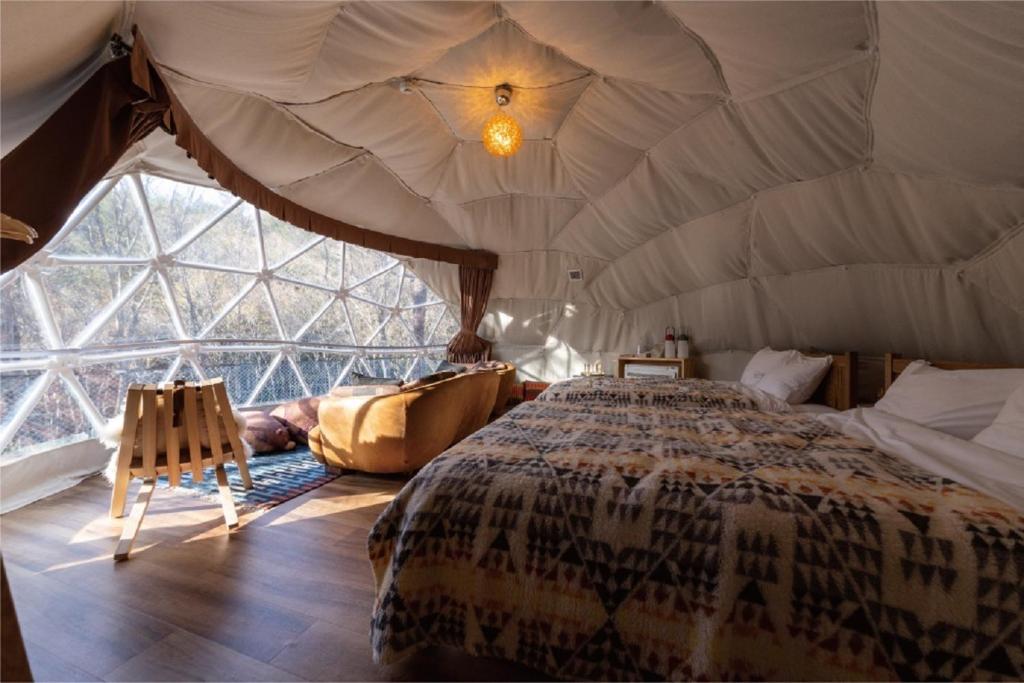 Postelja oz. postelje v sobi nastanitve Hoko Glamping- Camp - Vacation STAY 51101v