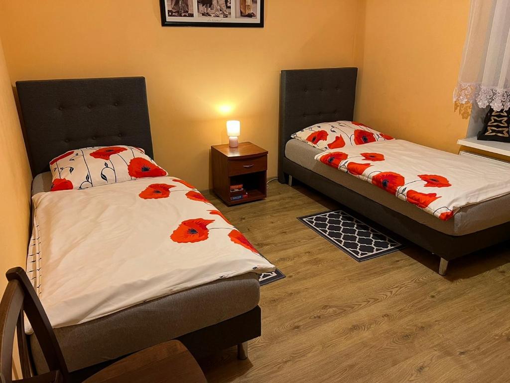 Posteľ alebo postele v izbe v ubytovaní Apartament Kudowa Zdrój - Słone 60m2