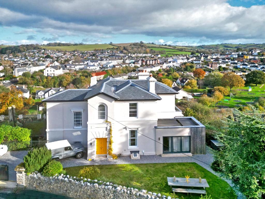 an aerial view of a white house at The Surveyors House Devon, Luxury Victorian Villa in Torbay in Kingskerswell