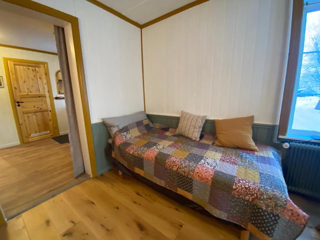 Postel nebo postele na pokoji v ubytování Per-Sims