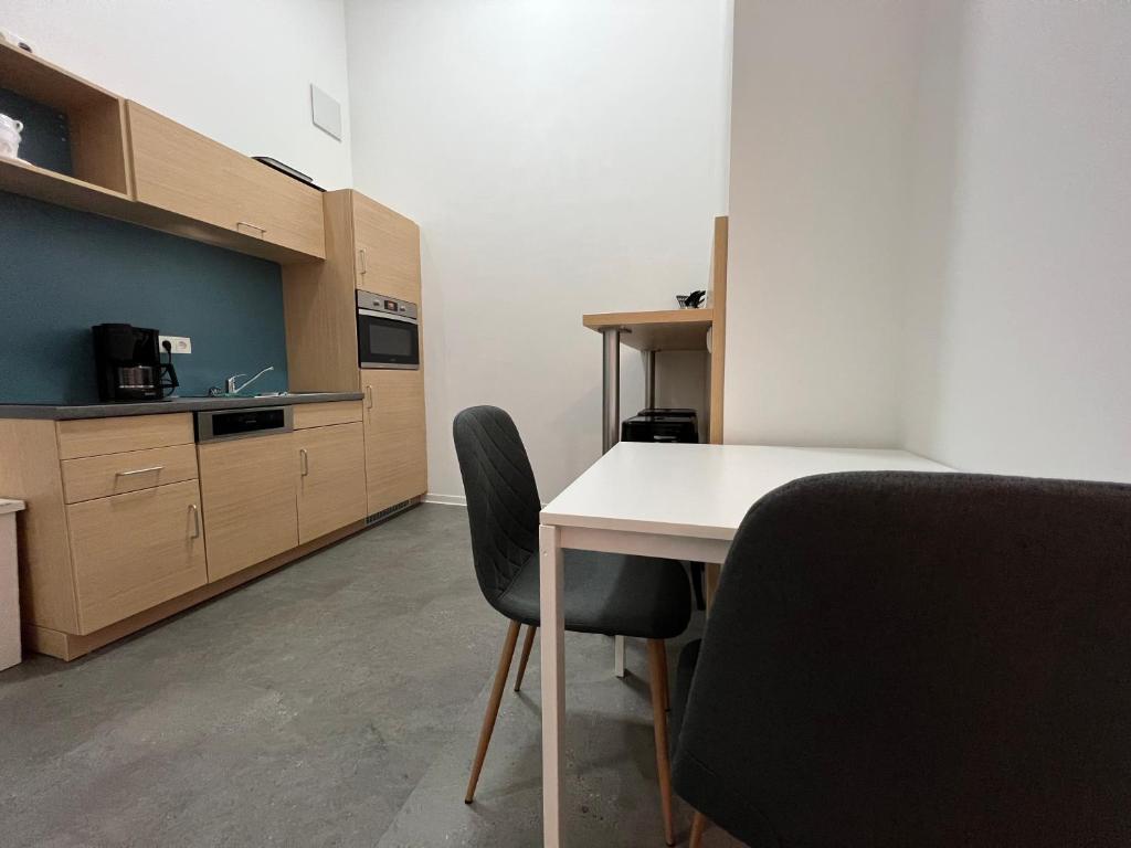 Kuchyň nebo kuchyňský kout v ubytování Fabella Flats Forchheim