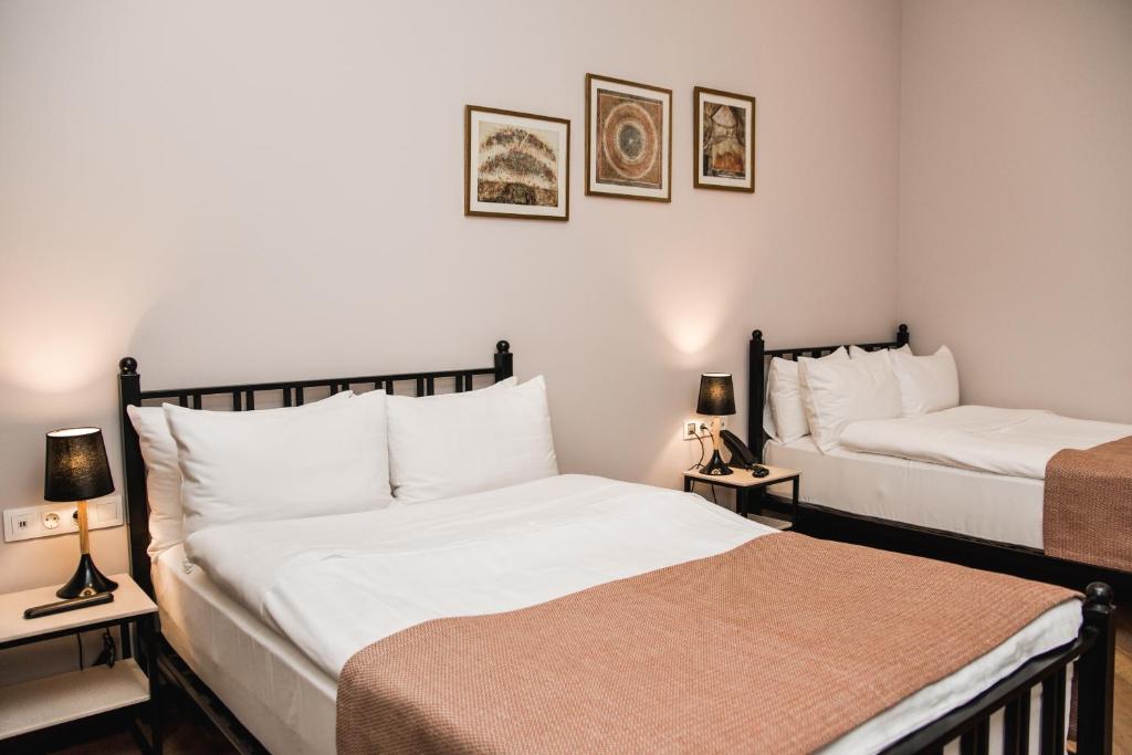 Postel nebo postele na pokoji v ubytování Makmani Boutique Hotel by DNT Group