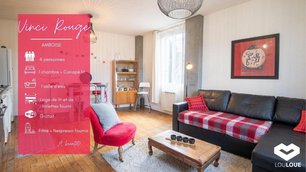 uma sala de estar com um sofá e um sinal vermelho em "AU VINCI ROUGE" Downtown - Modern - Bright em Amboise