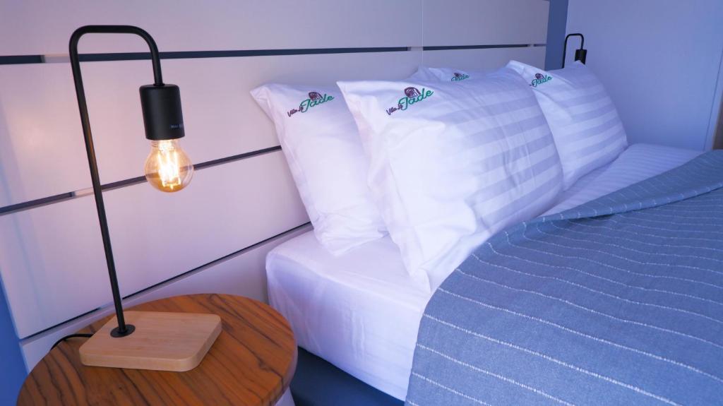 Postel nebo postele na pokoji v ubytování Villa La Jade Chaweng Noi 2BR