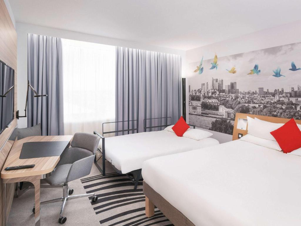 Postel nebo postele na pokoji v ubytování Novotel Valence Sud