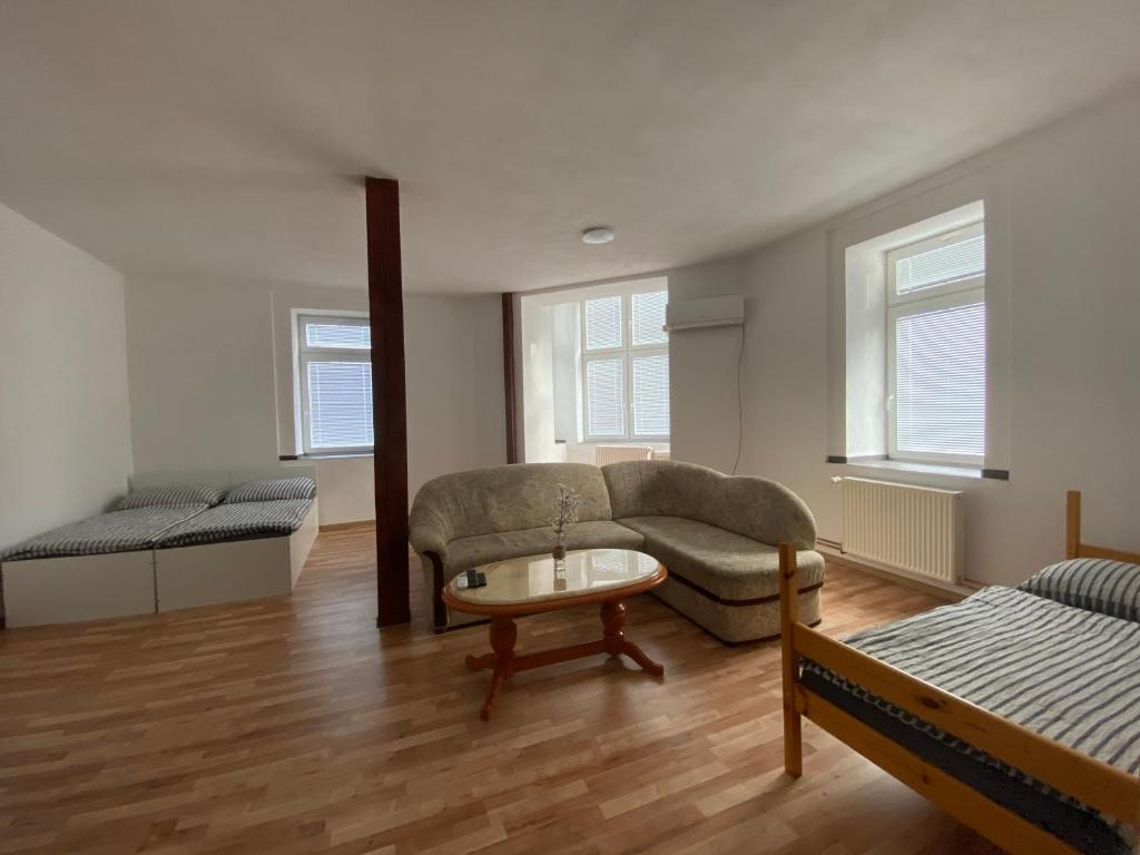 Postel nebo postele na pokoji v ubytování Apartmány Pražská