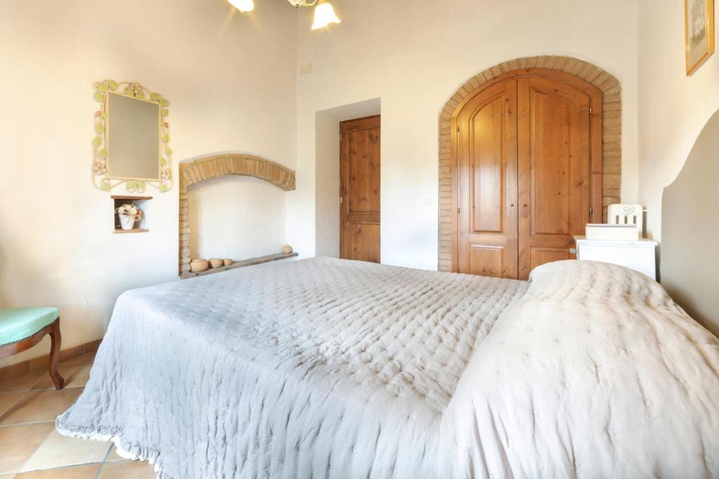 Posteľ alebo postele v izbe v ubytovaní Agriturismo La Valle A Polvereto