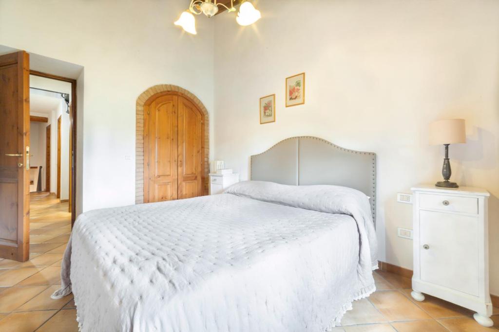 Posteľ alebo postele v izbe v ubytovaní Agriturismo La Valle A Polvereto