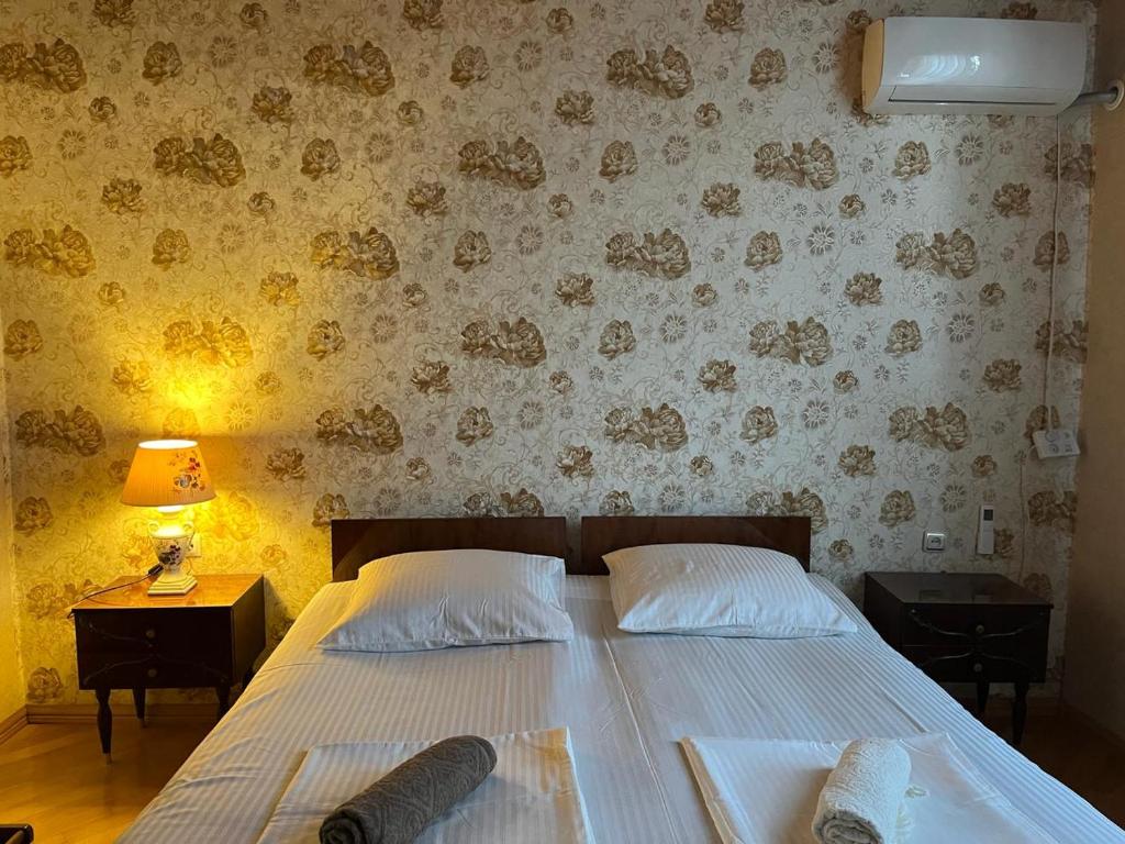 Postel nebo postele na pokoji v ubytování Guest House Levan II Dadiani