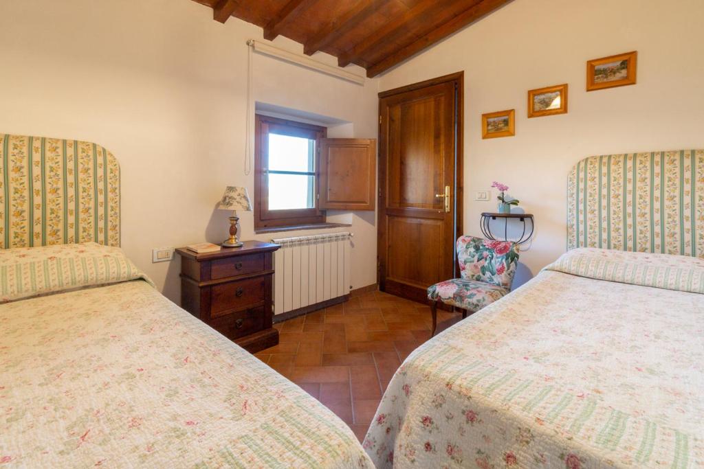 Posteľ alebo postele v izbe v ubytovaní Agriturismo La Valle A Polvereto