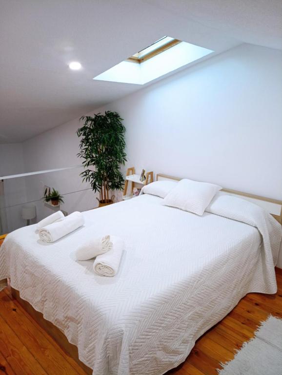 Ένα ή περισσότερα κρεβάτια σε δωμάτιο στο Sevilla BRISAS VIP Valencina de la concepción