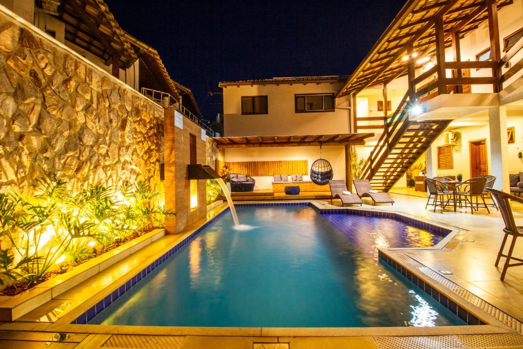 A piscina localizada em Hotel Bem Brasil ou nos arredores