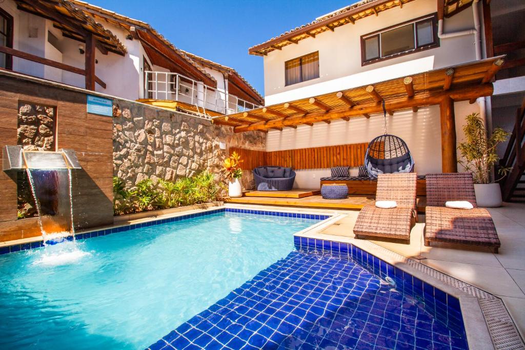 A piscina localizada em Hotel Bem Brasil ou nos arredores