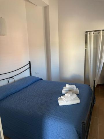 Postel nebo postele na pokoji v ubytování case al borgo