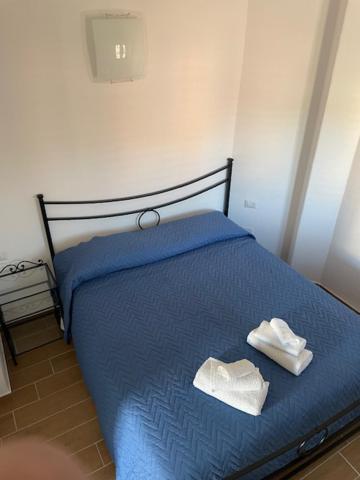 Postel nebo postele na pokoji v ubytování case al borgo