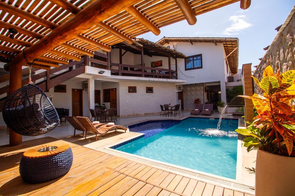 A piscina localizada em Hotel Bem Brasil ou nos arredores