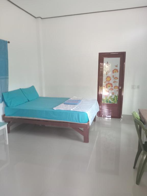 Chom Suan Farmstayにあるベッド