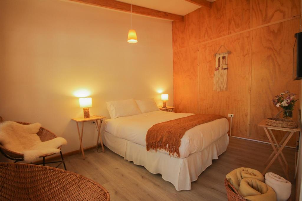 Postel nebo postele na pokoji v ubytování El Arbol Eco Lodge