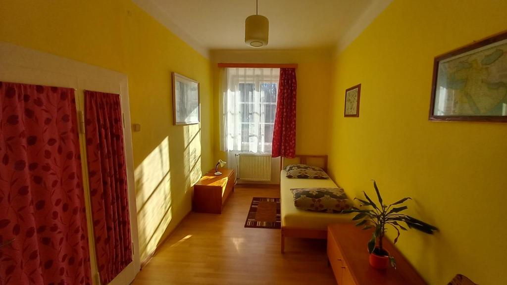 Postel nebo postele na pokoji v ubytování Apartman pod Zamkem