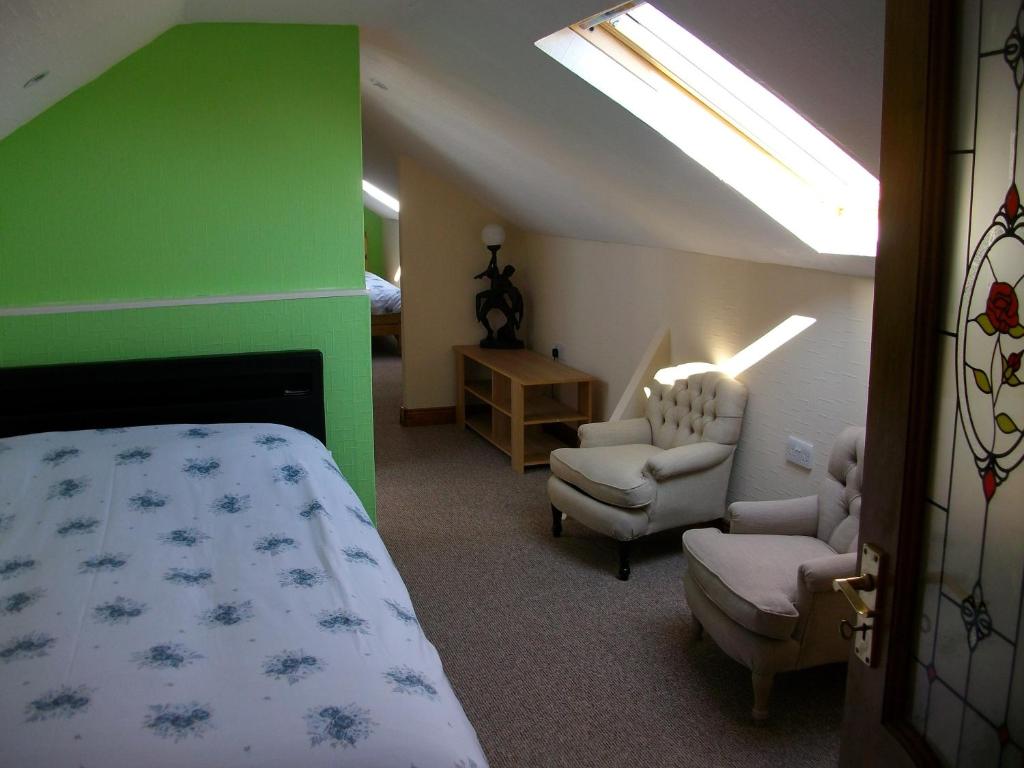 Postel nebo postele na pokoji v ubytování Clonmacnoise B&B