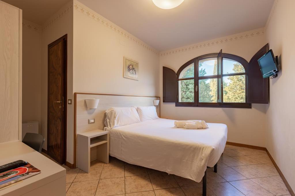 Postel nebo postele na pokoji v ubytování Villa La Stella