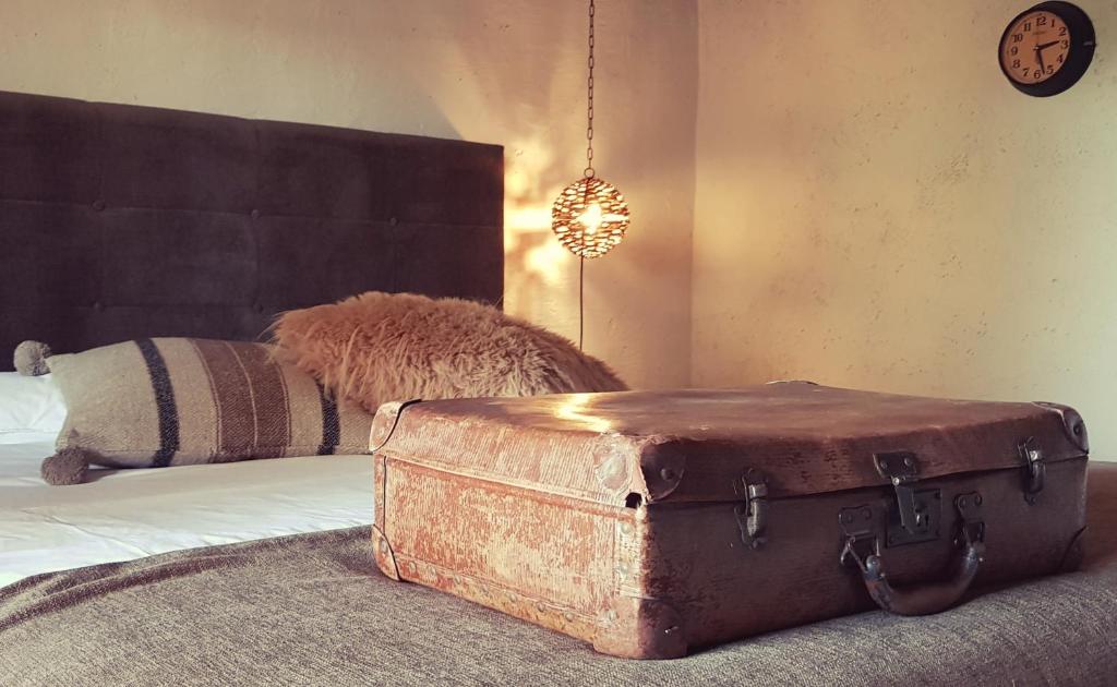 Postel nebo postele na pokoji v ubytování Le Lodge des Flâneurs