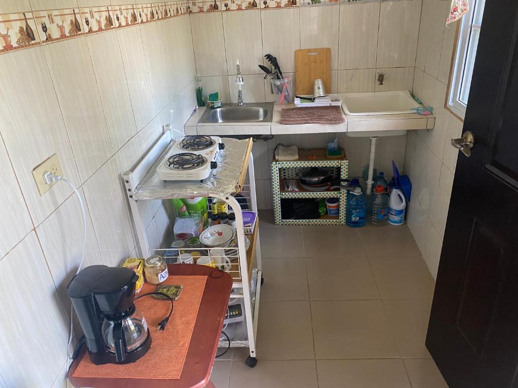 Kuchyň nebo kuchyňský kout v ubytování Acogedora vivienda anexa en un barrio tranquilo
