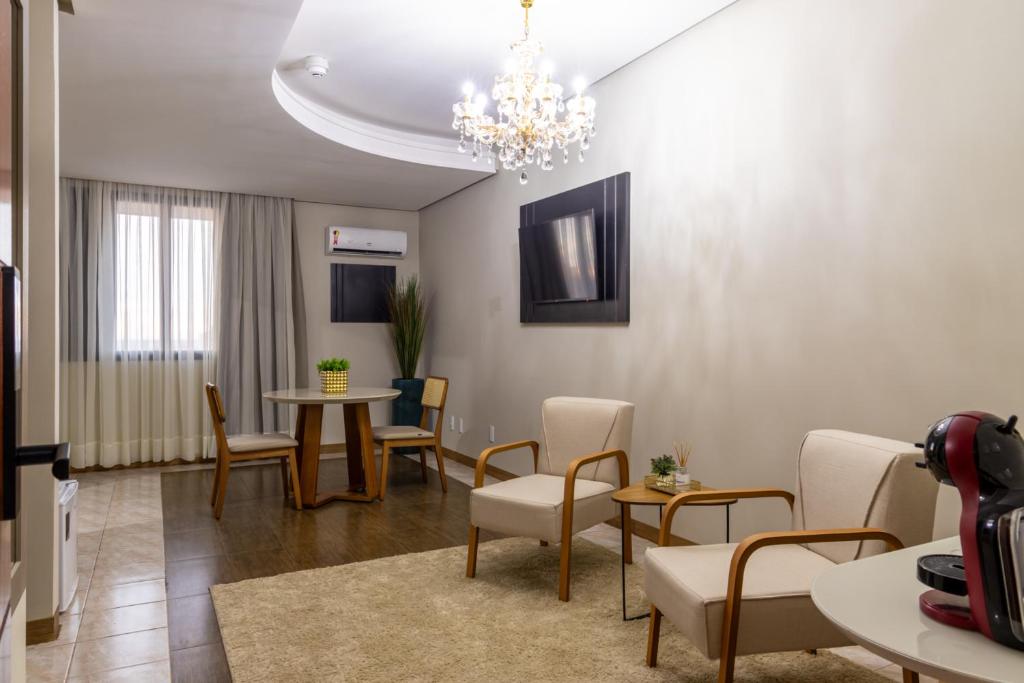 TV a/nebo společenská místnost v ubytování Hotel Dan Inn Uberlandia By Nacional Inn