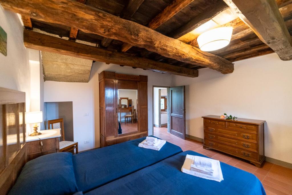 Postel nebo postele na pokoji v ubytování Borgo Macereto