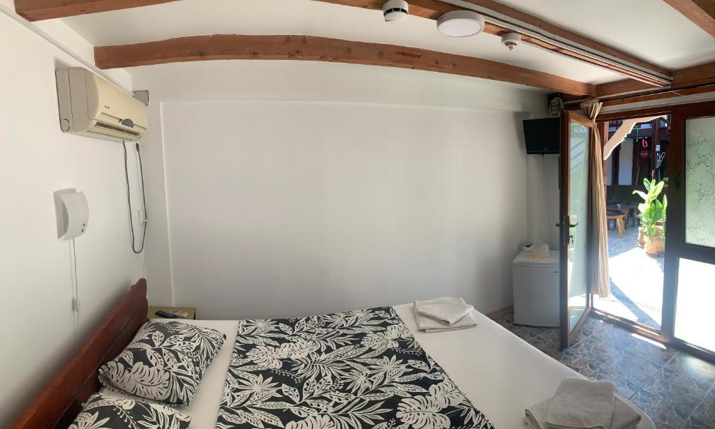 Postel nebo postele na pokoji v ubytování Bazart Vama Veche