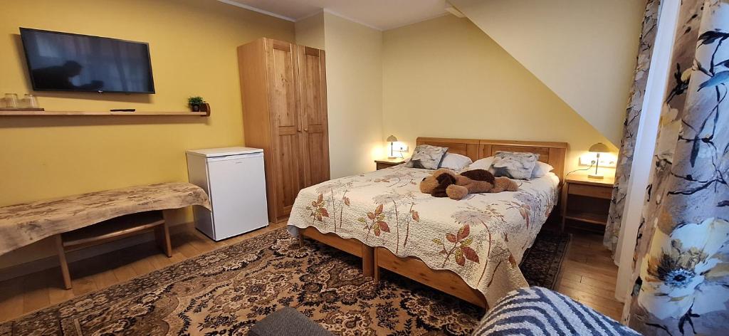 Postel nebo postele na pokoji v ubytování Hotel Senlīči