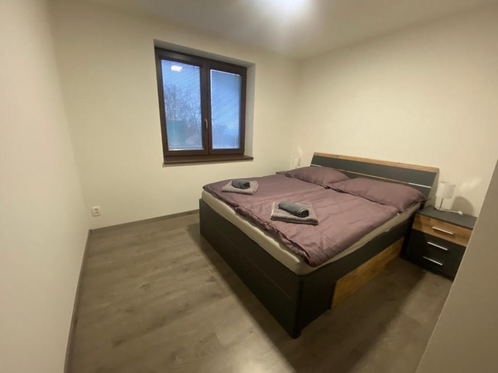 Postel nebo postele na pokoji v ubytování Apartmán pod Pálavskými vrchy